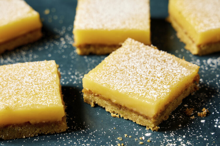 Savory olive oil, buttery pistachios bring  sophisticated flavors to tangy-sweet lemon bars